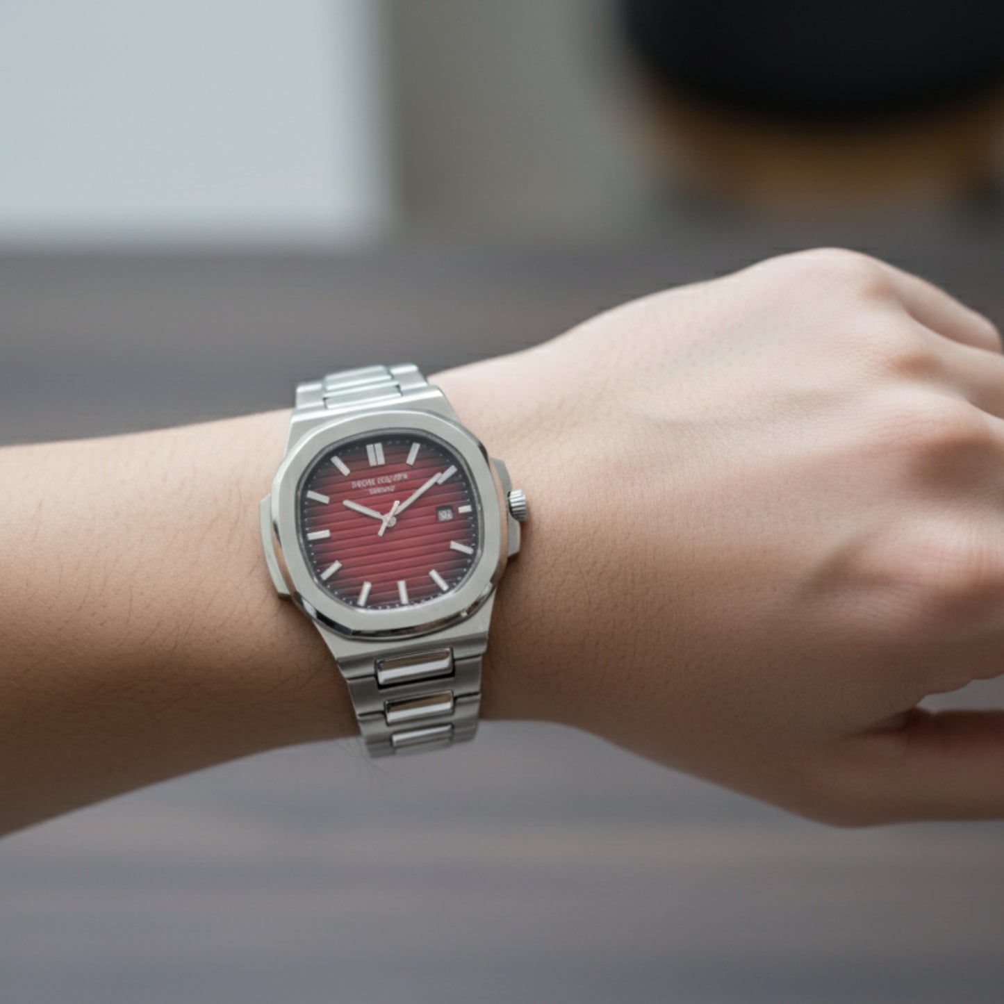 Nautilus Elite – Red Dial Silver Edition